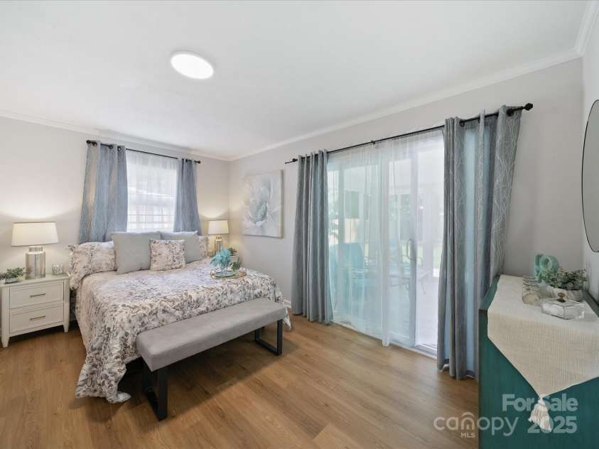 2213 Milton Road, Charlotte, NC 28215.  MLS# CAR4326281, YatesRealty ID 12108. A new sliding door opens onto the screen porch.