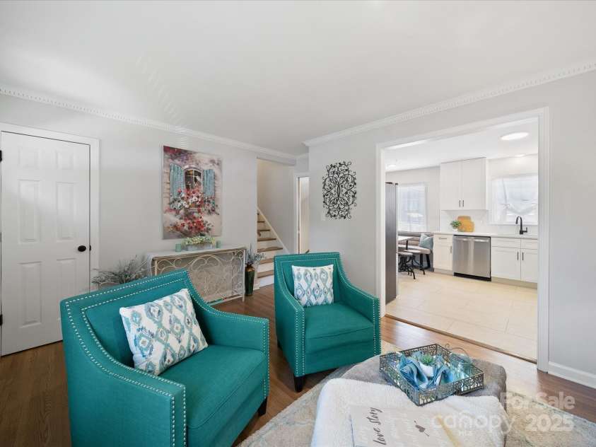 2213 Milton Road, Charlotte, NC 28215.  MLS# CAR4326281, YatesRealty ID 12108. Enlarged opening to kitchen.