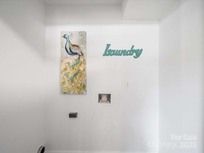 2213 Milton Road, Charlotte, NC 28215.  MLS# CAR4326281, YatesRealty ID 12108. Huge laundry closet is conveniently located on lower level beside drop zone