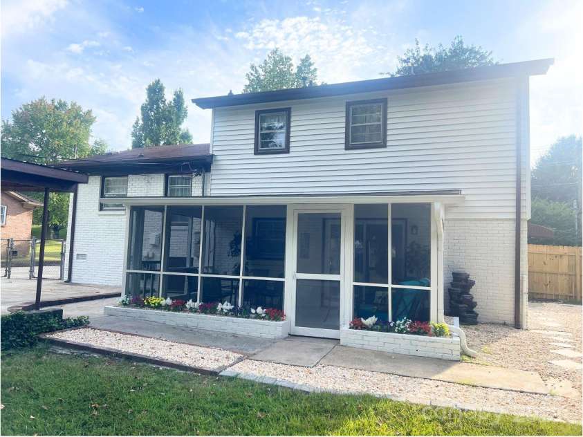 2213 Milton Road, Charlotte, NC 28215.  MLS# CAR4326281, YatesRealty ID 12108. Rear view with oversized screen porch off the rear