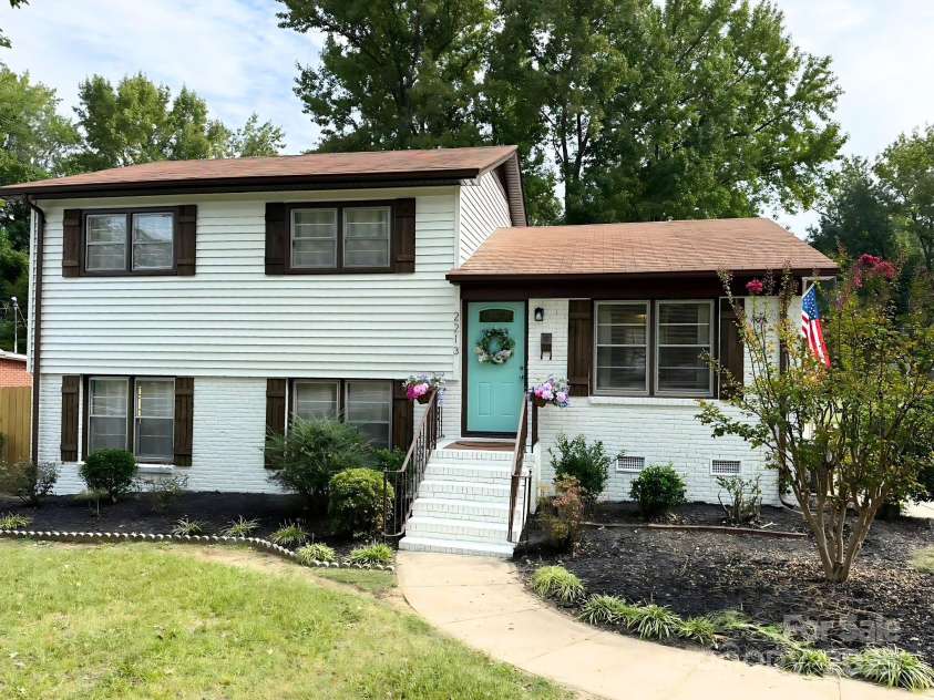2213 Milton Road, Charlotte, NC 28215.  MLS# CAR4326281, YatesRealty ID 12108. Renovated midcentury in Plaza Midwood corridor