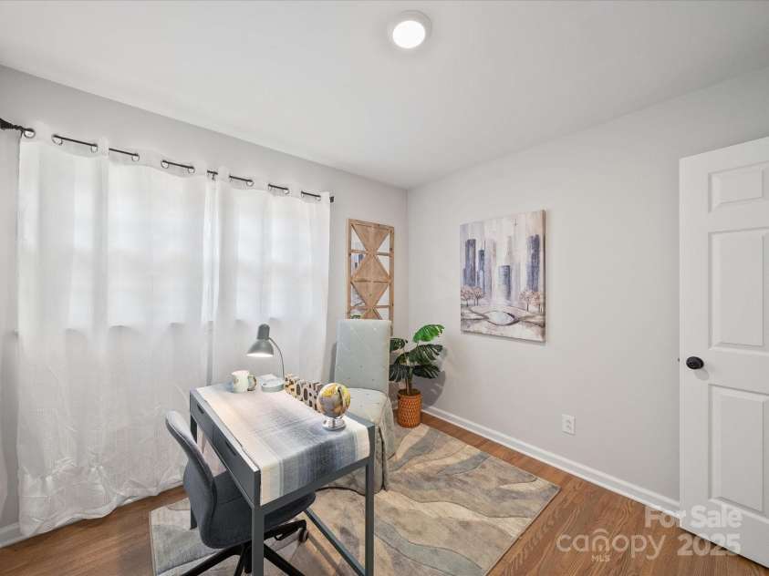 2213 Milton Road, Charlotte, NC 28215.  MLS# CAR4326281, YatesRealty ID 12108. This bedroom is staged as an office but could easily hold a queen bed