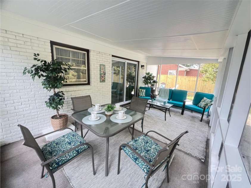 2213 Milton Road, Charlotte, NC 28215.  MLS# CAR4326281, YatesRealty ID 12108. This screened porch has three entry points