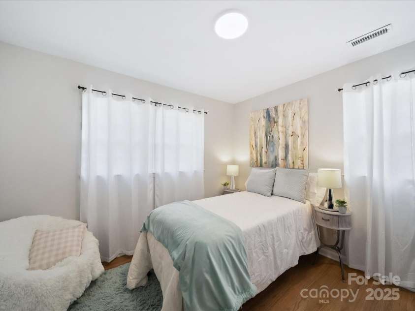 2213 Milton Road, Charlotte, NC 28215.  MLS# CAR4326281, YatesRealty ID 12108. Upper-level bedroom