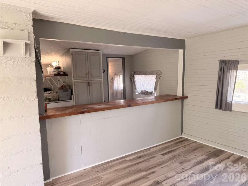 5A Warren Avenue, Asheville, NC 28803.  MLS# CAR4368557, YatesRealty ID 12112. House has new flooring.