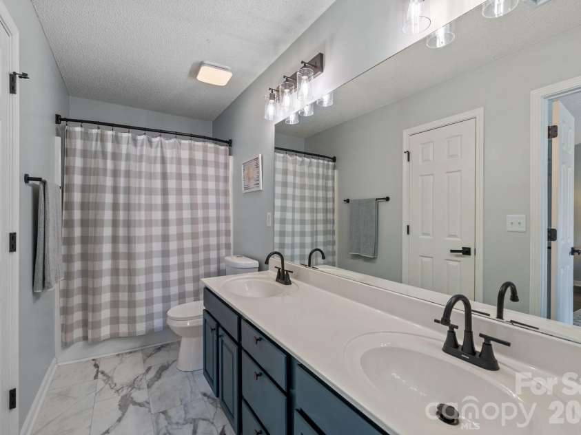 213 Butler Place, Fort Mill, SC 29715.  MLS# CAR4367950, YatesRealty ID 12117. 