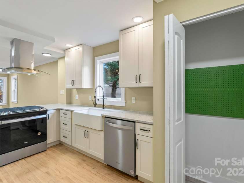 5 Elmore Street, Asheville, NC 28804.  MLS# CAR4252393, YatesRealty ID 12118. Bright, functional kitchen with all new cabinets and appliances