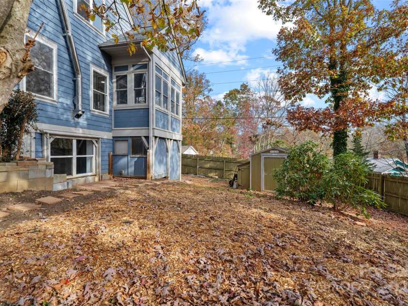 5 Elmore Street, Asheville, NC 28804.  MLS# CAR4252393, YatesRealty ID 12118. Plenty of storage and fully fenced-in yard