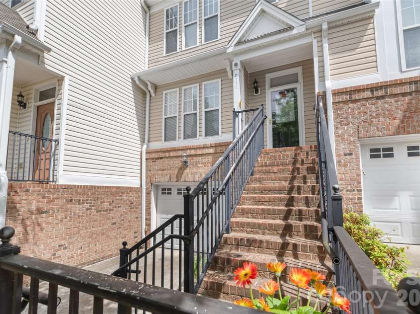 7111 Founders Club Court, Charlotte, NC 28269.  MLS# CAR4370503, YatesRealty ID 12118. 3 story townhome