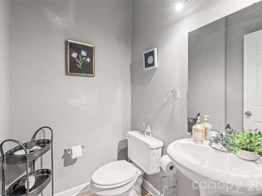 7111 Founders Club Court, Charlotte, NC 28269.  MLS# CAR4370503, YatesRealty ID 12118. Half bath on main level