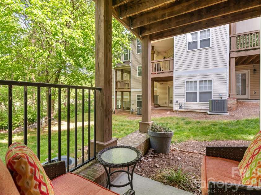 7111 Founders Club Court, Charlotte, NC 28269.  MLS# CAR4370503, YatesRealty ID 12118. Lower level patio