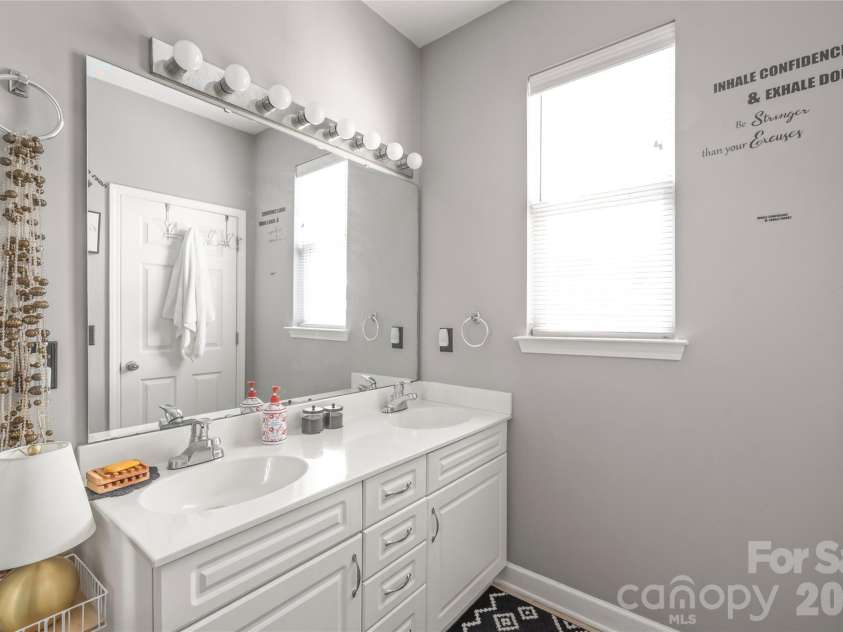 7111 Founders Club Court, Charlotte, NC 28269.  MLS# CAR4370503, YatesRealty ID 12118. Primary double vanity