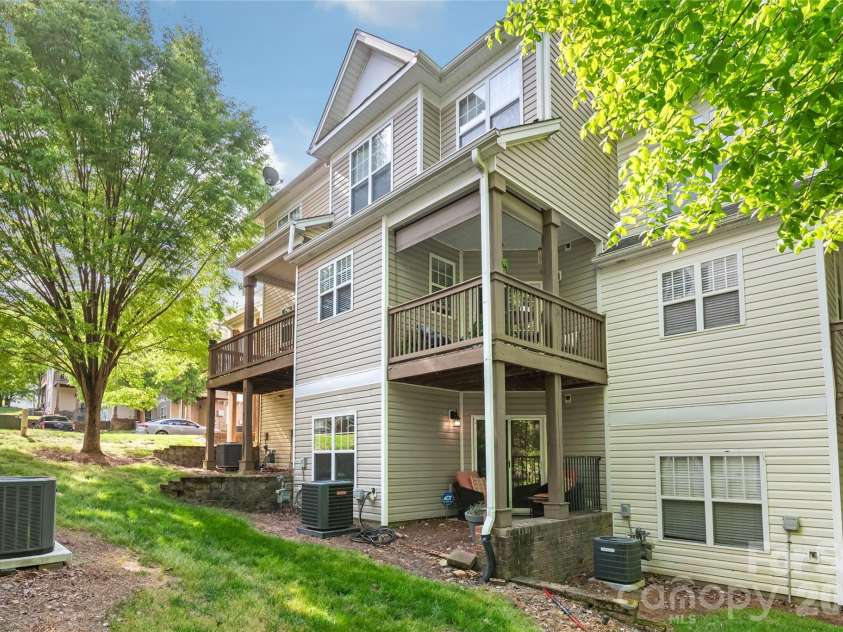 7111 Founders Club Court, Charlotte, NC 28269.  MLS# CAR4370503, YatesRealty ID 12118. View from backyard