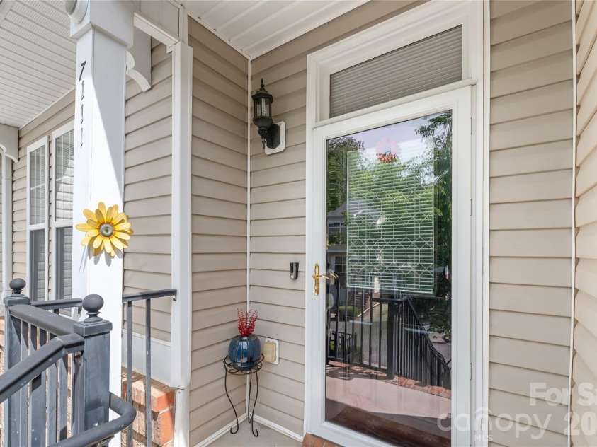 7111 Founders Club Court, Charlotte, NC 28269.  MLS# CAR4370503, YatesRealty ID 12118. Welcome Home