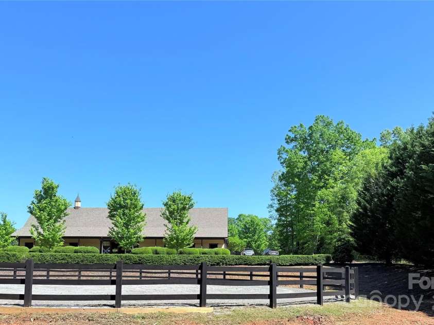 0 Mapleton Lane, Columbus, NC 28722.  MLS# CAR4257492, YatesRealty ID 12125. Community Equestrian Facilities and Trails await on your new dream home, lake front lot!