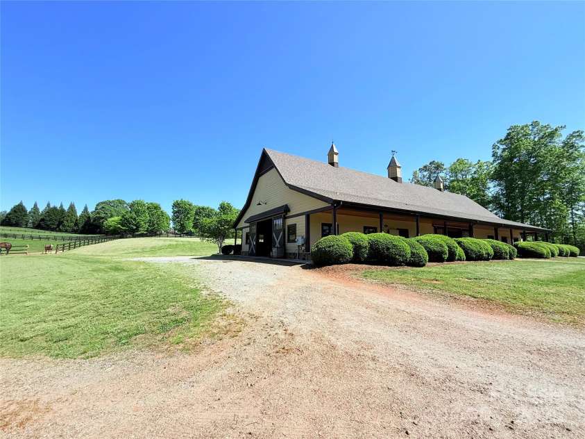 0 Mapleton Lane, Columbus, NC 28722.  MLS# CAR4257492, YatesRealty ID 12125. Community Equestrian Facilities and Trails await on your new dream home, lake front lot!