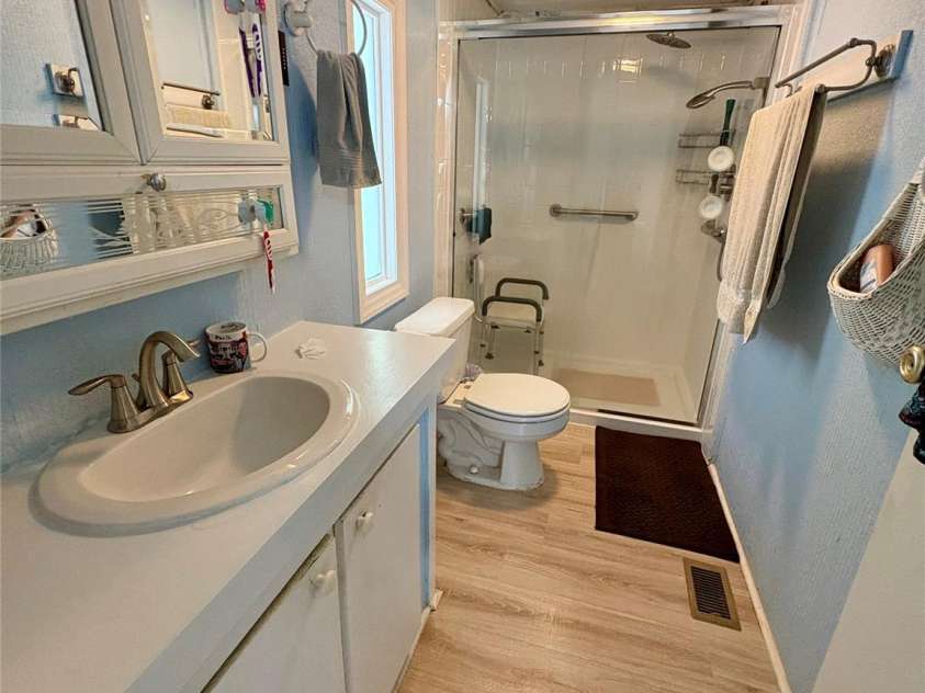 5022 Wrenn Drive, Denver, NC 28037.  MLS# CAR4370723, YatesRealty ID 12129. Updated walk in shower