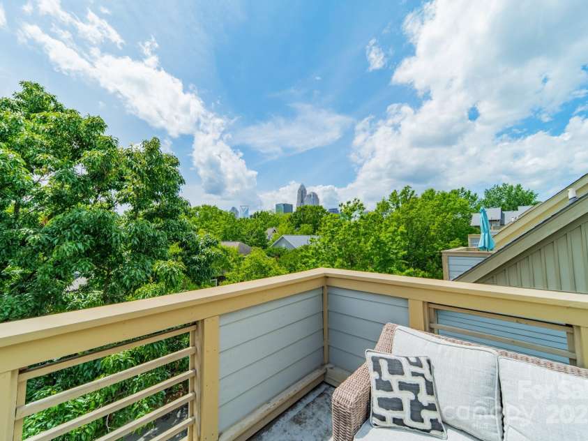 738 Garden District Drive, Charlotte, NC 28202.  MLS# CAR4255634, YatesRealty ID 12131. Rooftop Terrace view into Uptown