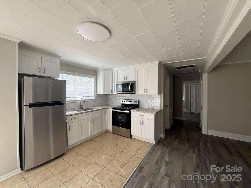 1408 Linwood Road, Gastonia, NC 28052.  MLS# CAR4233382, YatesRealty ID 12148. 