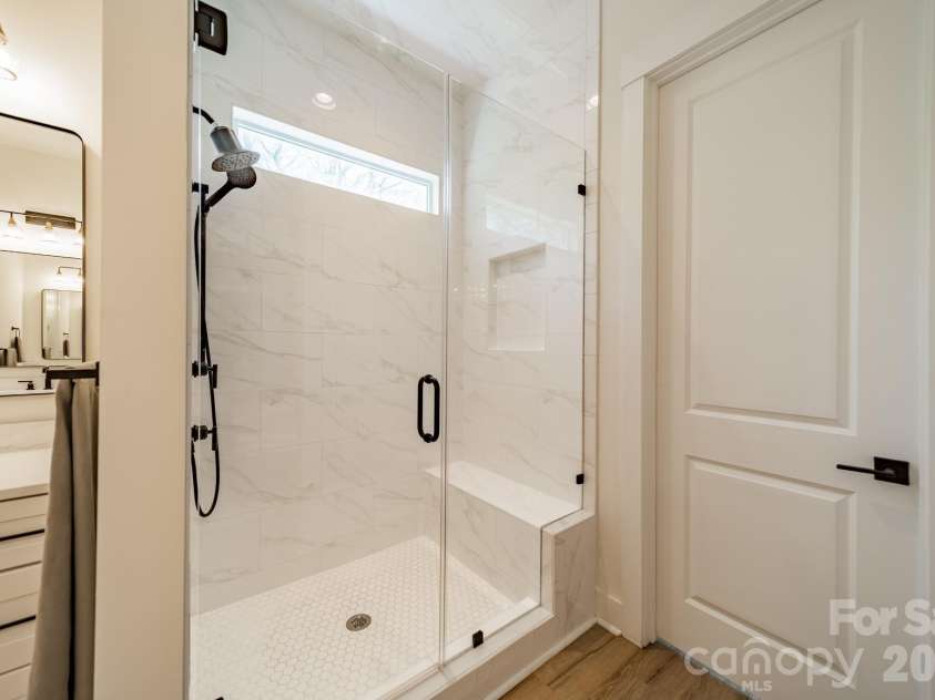 5201 Meadowland Parkway, Monroe, NC 28112.  MLS# CAR4364272, YatesRealty ID 12151. Primary Bath Shower with floor to ceiling tile