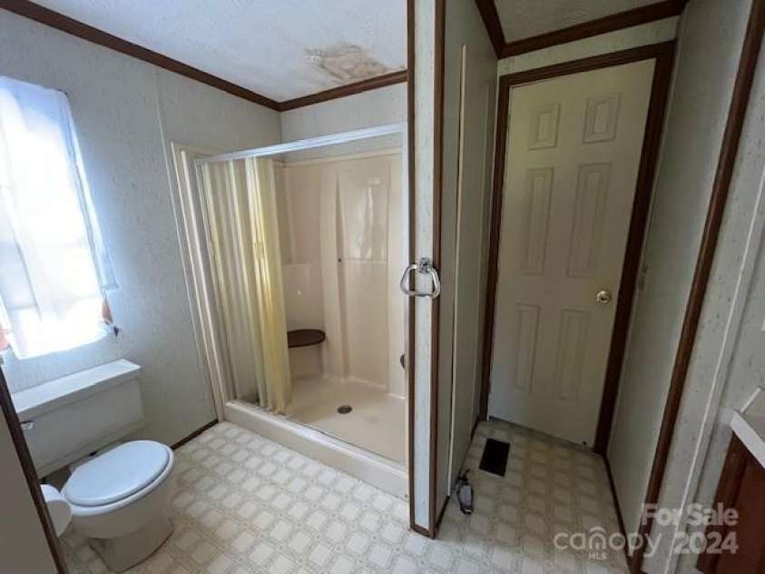 299 Stikeleather Road, Hiddenite, NC 28636.  MLS# CAR4200521, YatesRealty ID 12155. 