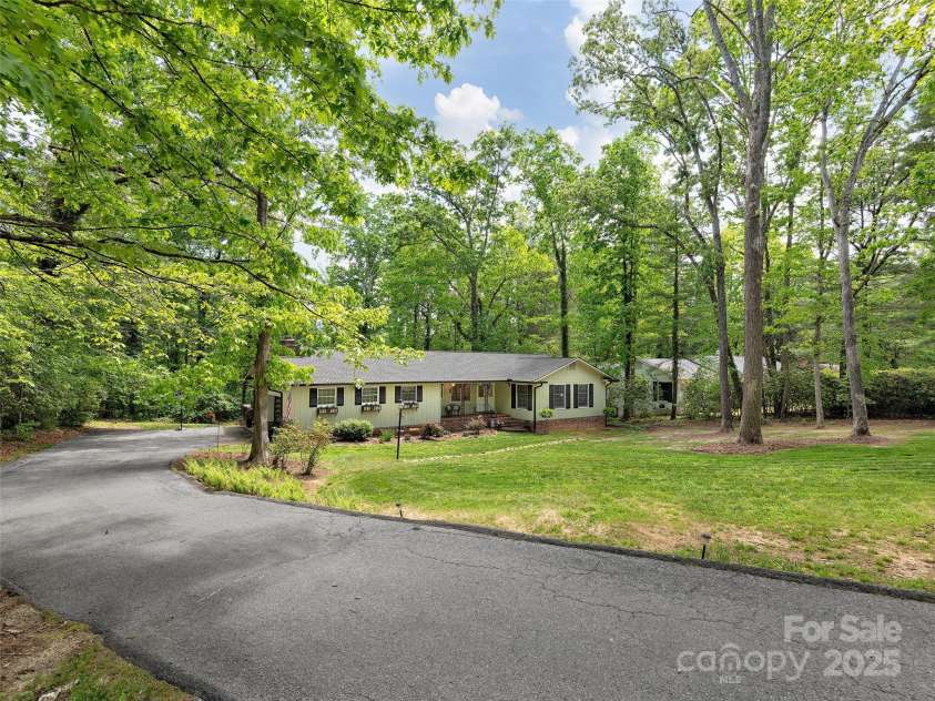 214 Heathcote Road, Hendersonville, NC 28791.  MLS# CAR4257655, YatesRealty ID 12159. 