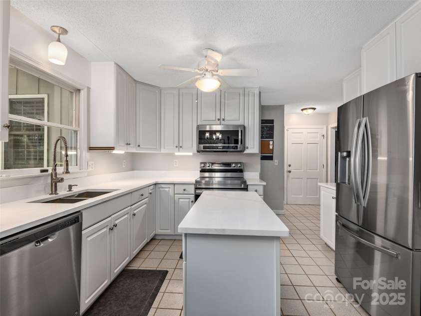 214 Heathcote Road, Hendersonville, NC 28791.  MLS# CAR4257655, YatesRealty ID 12159. 