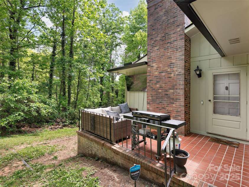214 Heathcote Road, Hendersonville, NC 28791.  MLS# CAR4257655, YatesRealty ID 12159. 