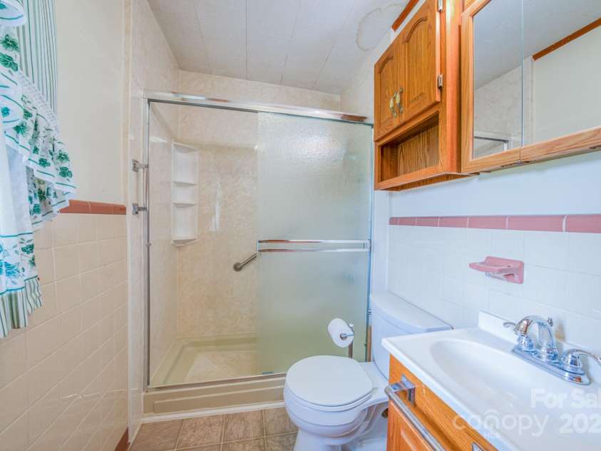 502 and  504 Old US 19 23 Highway, Candler, NC 28715.  MLS# CAR4164132, YatesRealty ID 12166. Bathroom
