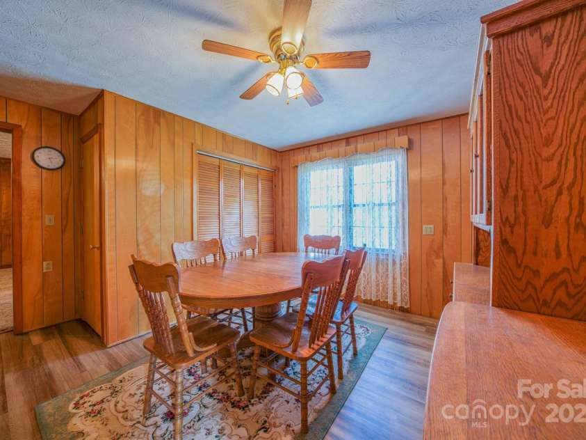 502 and  504 Old US 19 23 Highway, Candler, NC 28715.  MLS# CAR4164132, YatesRealty ID 12166. Dining room