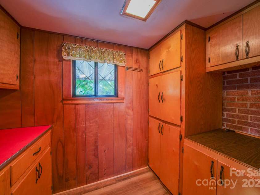 502 and  504 Old US 19 23 Highway, Candler, NC 28715.  MLS# CAR4164132, YatesRealty ID 12166. Pantry storage area