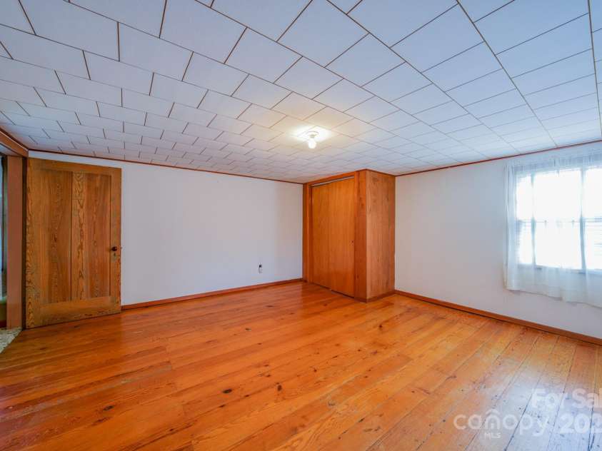 502 and  504 Old US 19 23 Highway, Candler, NC 28715.  MLS# CAR4164132, YatesRealty ID 12166. Upstair right  bedroom
