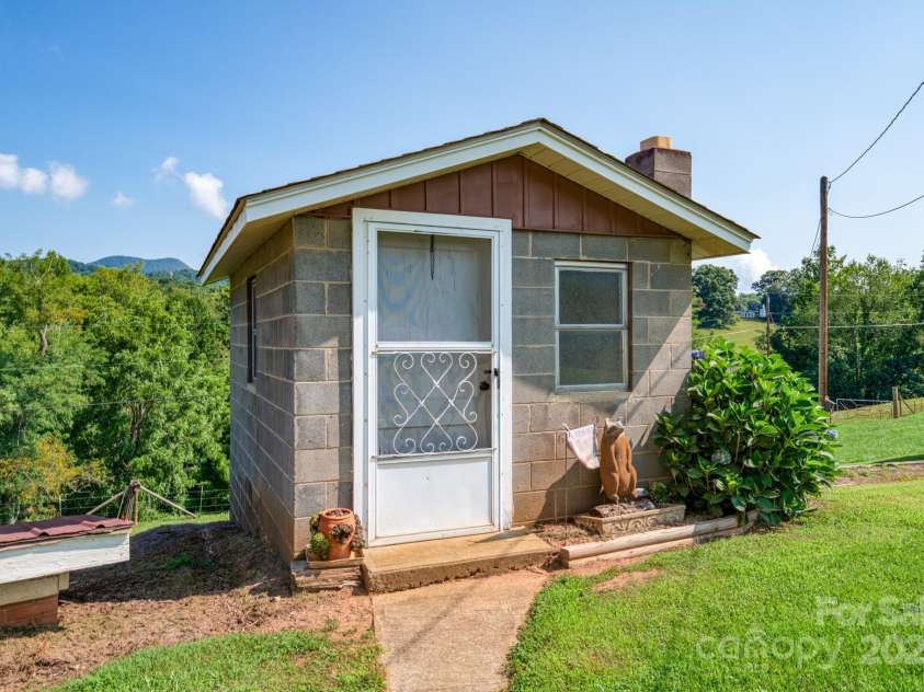 502 and  504 Old US 19 23 Highway, Candler, NC 28715.  MLS# CAR4164132, YatesRealty ID 12166. Well House