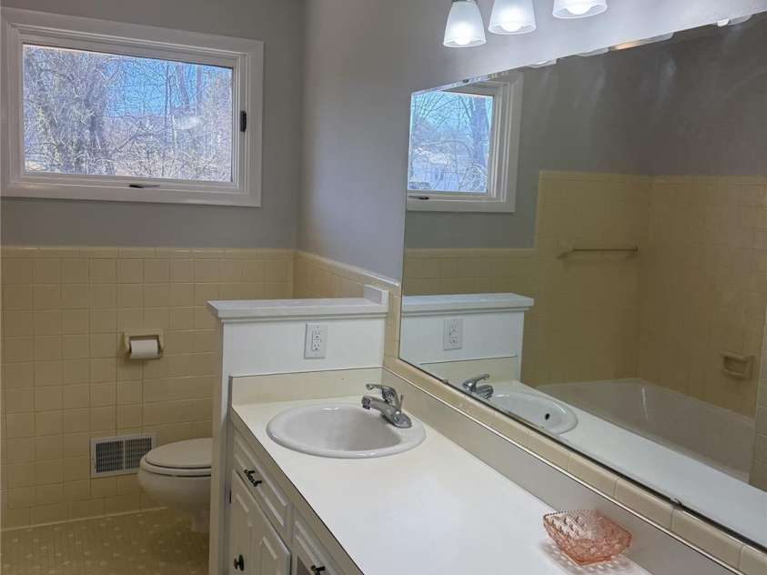 212 Shuping Street, Morganton, NC 28655.  MLS# CAR4329498, YatesRealty ID 12167. Full bath main floor hallway.