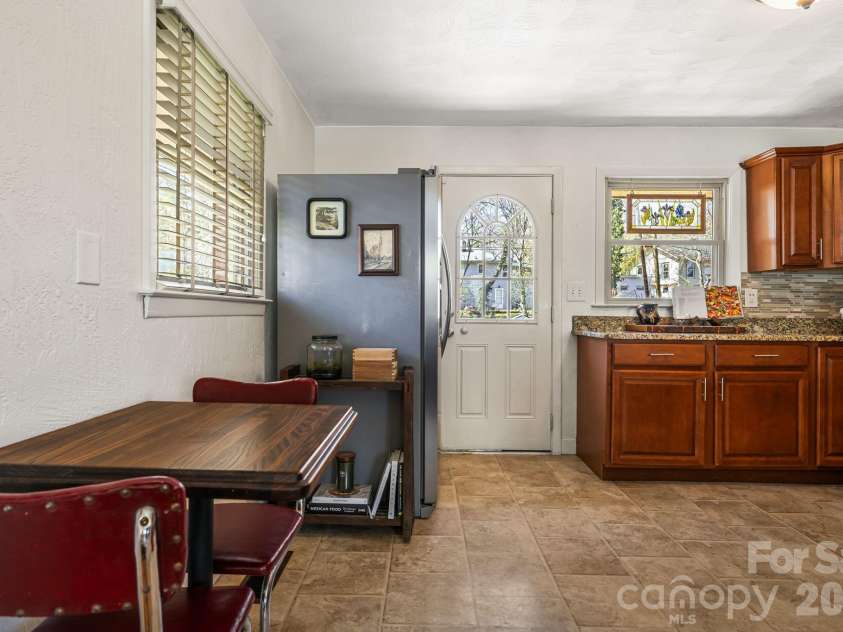 1733 Clairmont Drive, Hendersonville, NC 28791.  MLS# CAR4357860, YatesRealty ID 12169. Kitchen/dining area