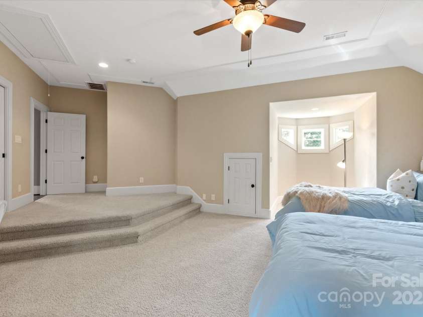 8904 Woodhall Lake Drive, Waxhaw, NC 28173.  MLS# CAR4253927, YatesRealty ID 12169. 2nd Floor XL Bedroom