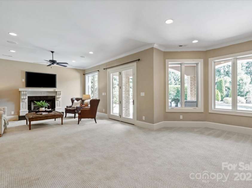 8904 Woodhall Lake Drive, Waxhaw, NC 28173.  MLS# CAR4253927, YatesRealty ID 12169. Basement Living Room