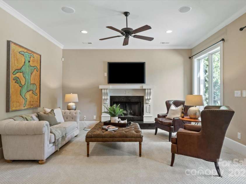 8904 Woodhall Lake Drive, Waxhaw, NC 28173.  MLS# CAR4253927, YatesRealty ID 12169. Basement Living Room