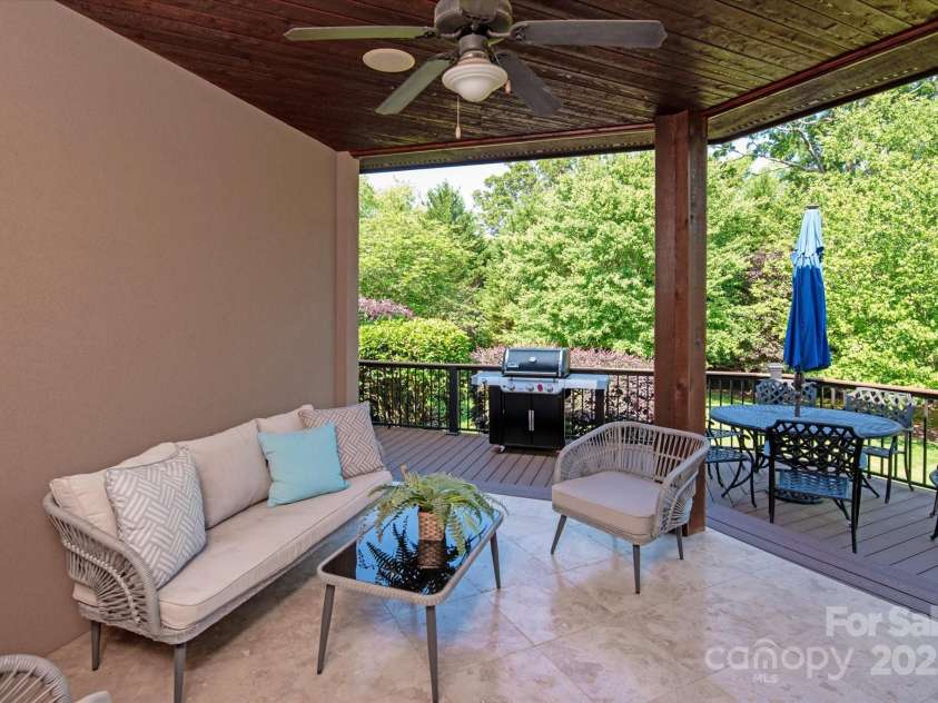 8904 Woodhall Lake Drive, Waxhaw, NC 28173.  MLS# CAR4253927, YatesRealty ID 12169. Covered Patio off of Family Room