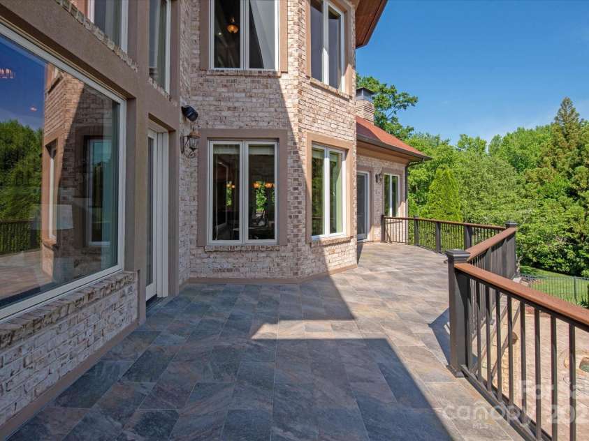 8904 Woodhall Lake Drive, Waxhaw, NC 28173.  MLS# CAR4253927, YatesRealty ID 12169. Rear Balcony Overlooking Pool