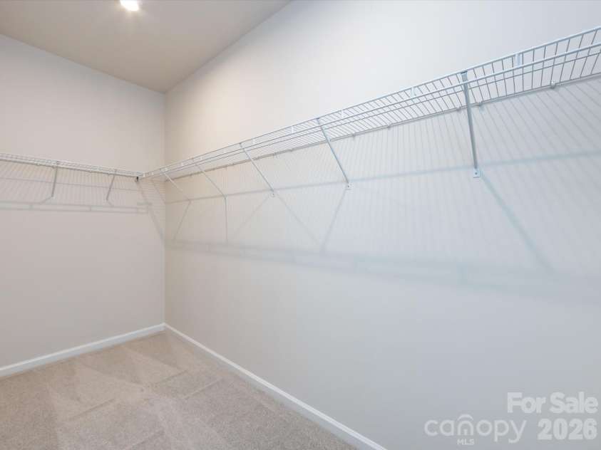 2108 Endeavor Run, Charlotte, NC 28269.  MLS# CAR4318966, YatesRealty ID 12171. Generously Sized Primary Walk-In Closet.