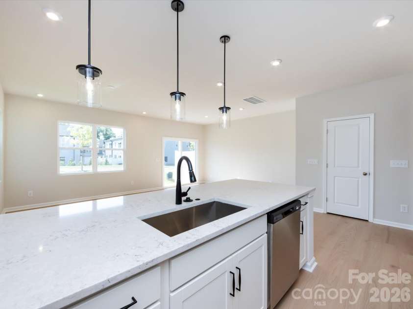 2108 Endeavor Run, Charlotte, NC 28269.  MLS# CAR4318966, YatesRealty ID 12171. Quartz Countertops and Crisp White Cabinetry.