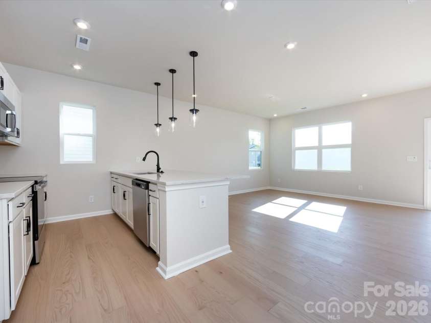 2108 Endeavor Run, Charlotte, NC 28269.  MLS# CAR4318966, YatesRealty ID 12171. Well Connected and Open Layout with Durable and Easy to Maintain Flooring Throughout.