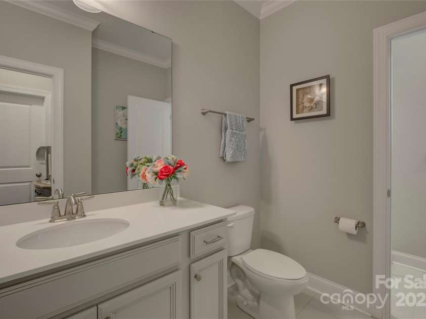 14229 Twin Eagles Lane, Charlotte, NC 28278.  MLS# CAR4235190, YatesRealty ID 12172. Guest bath on the main