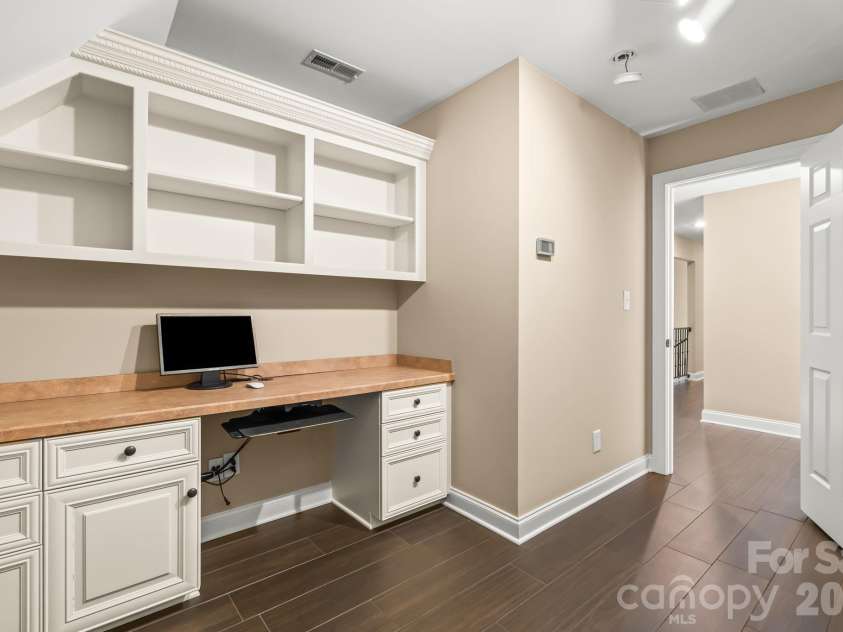 11555 Double Spring Road, Lewisville, NC 27023.  MLS# CAR4370300, YatesRealty ID 12175. 2nd level office space with built ins