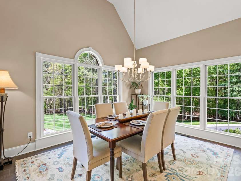 11555 Double Spring Road, Lewisville, NC 27023.  MLS# CAR4370300, YatesRealty ID 12175. Eat in kitchen with beautiful lighting from the oversized windows