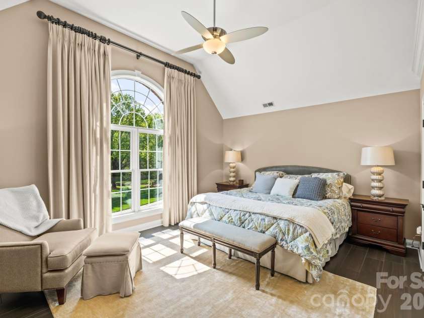 11555 Double Spring Road, Lewisville, NC 27023.  MLS# CAR4370300, YatesRealty ID 12175. High ceilings with floor to almost ceiling windows continue on the second floor
