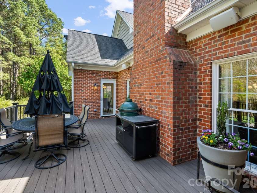 11555 Double Spring Road, Lewisville, NC 27023.  MLS# CAR4370300, YatesRealty ID 12175. The deck features Azek composite materials for the lighted floors and railings.