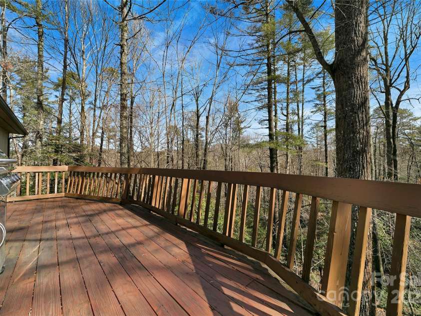 177 Walelu Court, Brevard, NC 28712.  MLS# CAR4223202, YatesRealty ID 1218. A great spot to hang out when you get back from playing golf, hiking, swimming, pickleball, tennis or bocce ball.