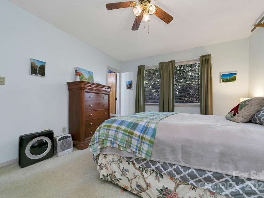 177 Walelu Court, Brevard, NC 28712.  MLS# CAR4223202, YatesRealty ID 1218. Door to the left in the Primary Bedroom leads to the en-suite Bathroom